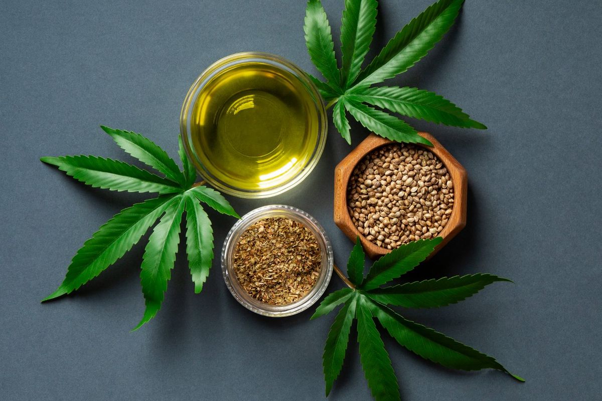 Pure golden CBD oil, hemp leaves, seeds and organic botanical extract