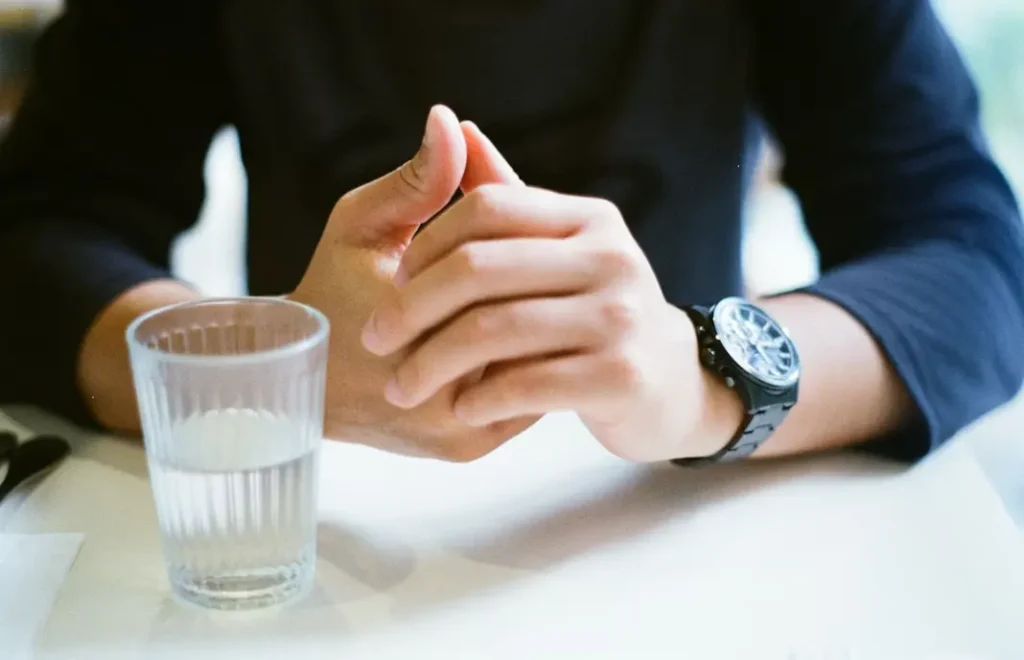 A guy with a Water of Glass